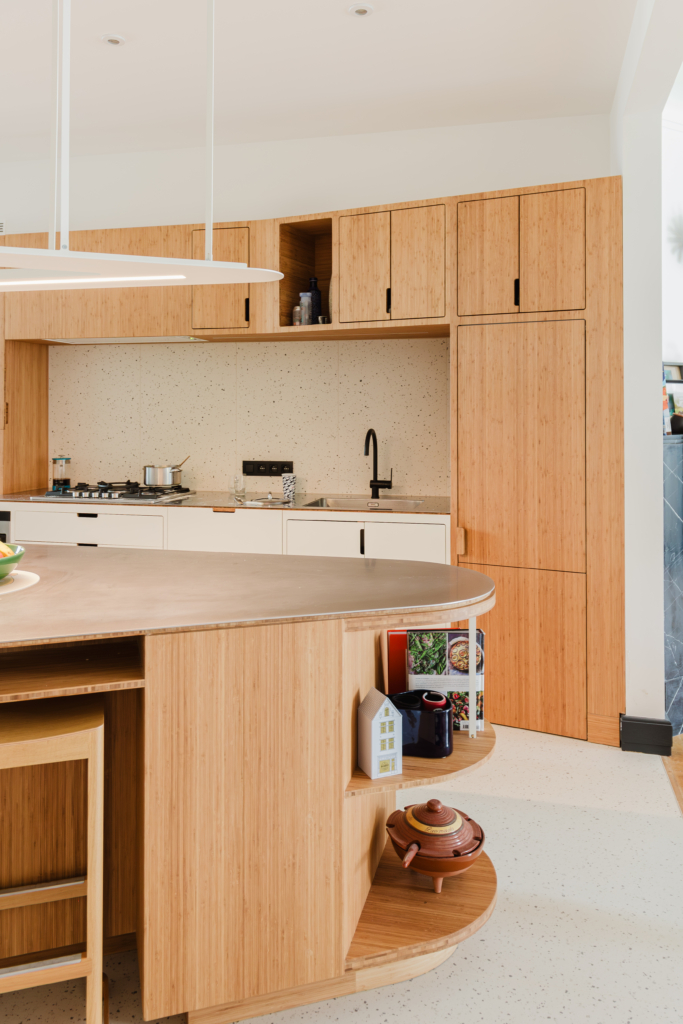 Custom-built kitchen with curved central island